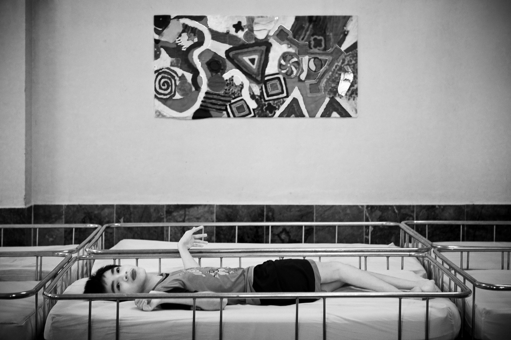 handicapped boy in crib vietnamese orphanage in ho chi minh city vietnam