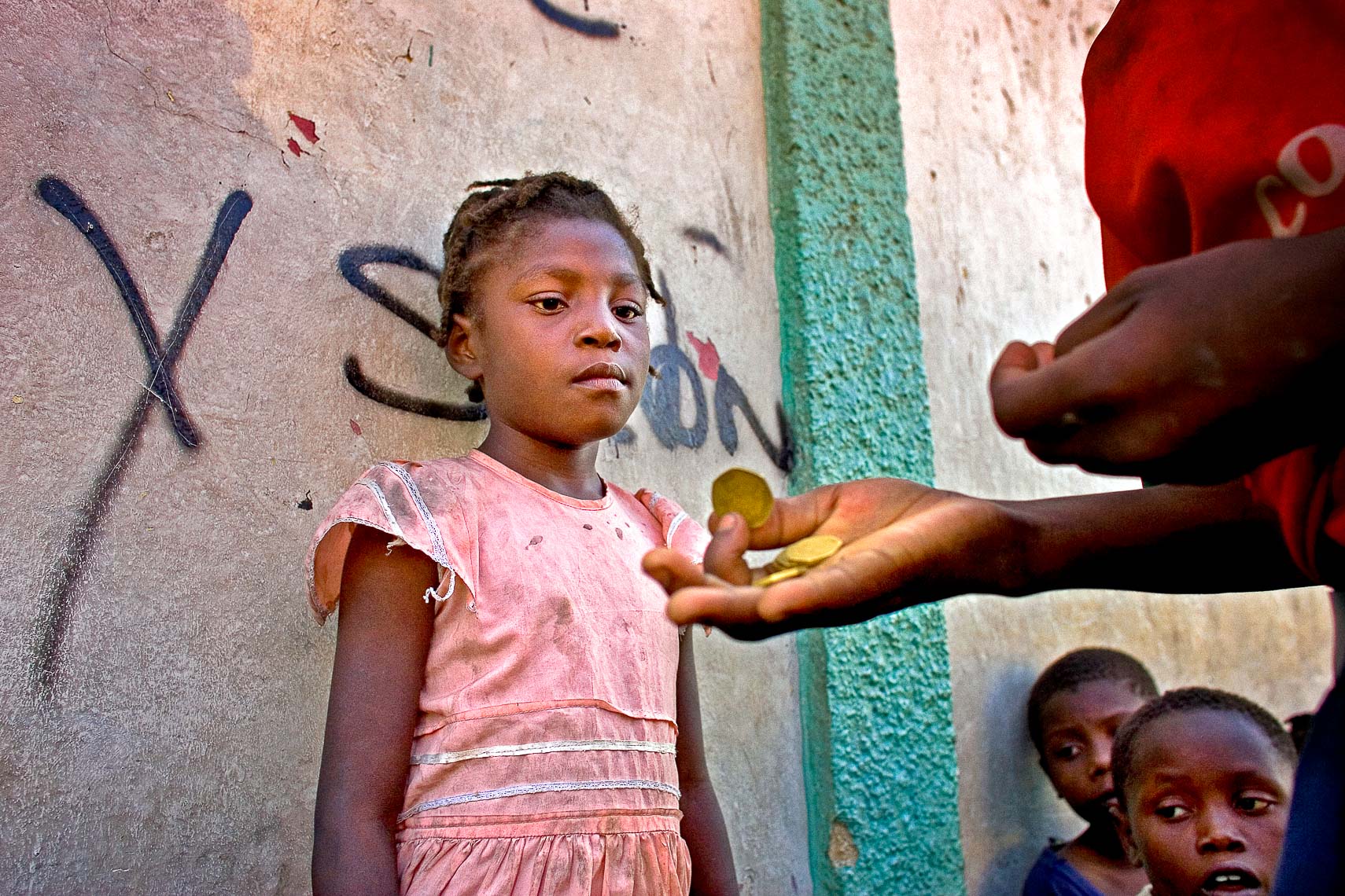 port a prince haiti street kid gng orphan receives coin