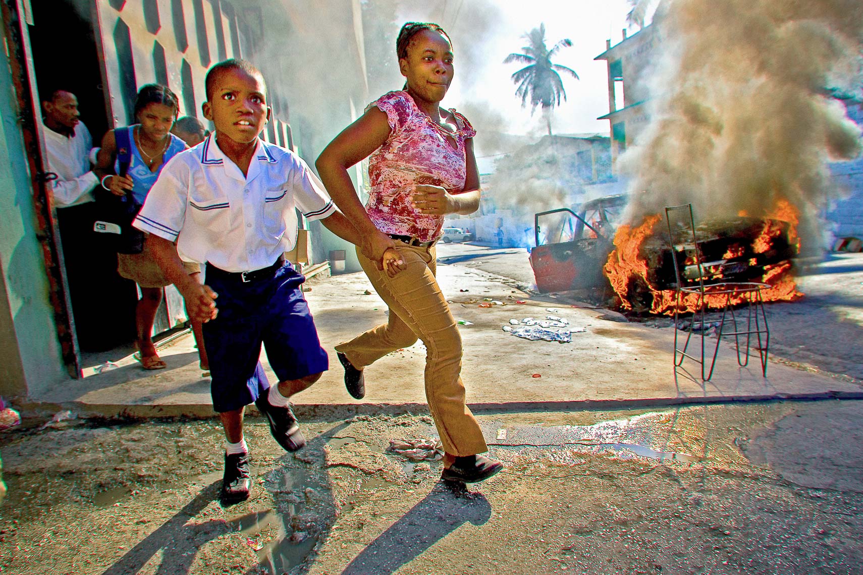 haiti port au prince car bomb gun fight school conflict