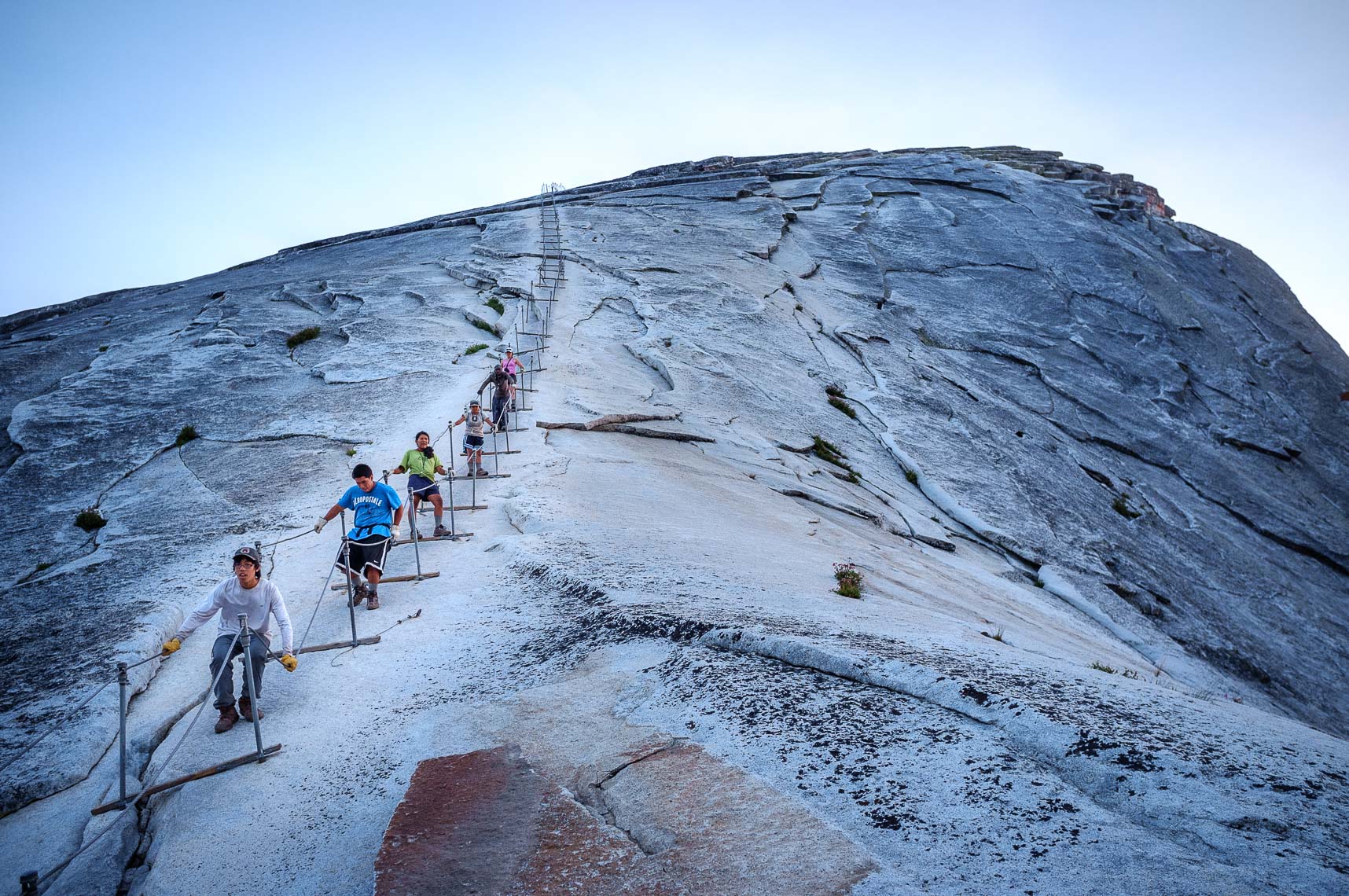 student hikers descend half dome in yosemite national park - the woods project