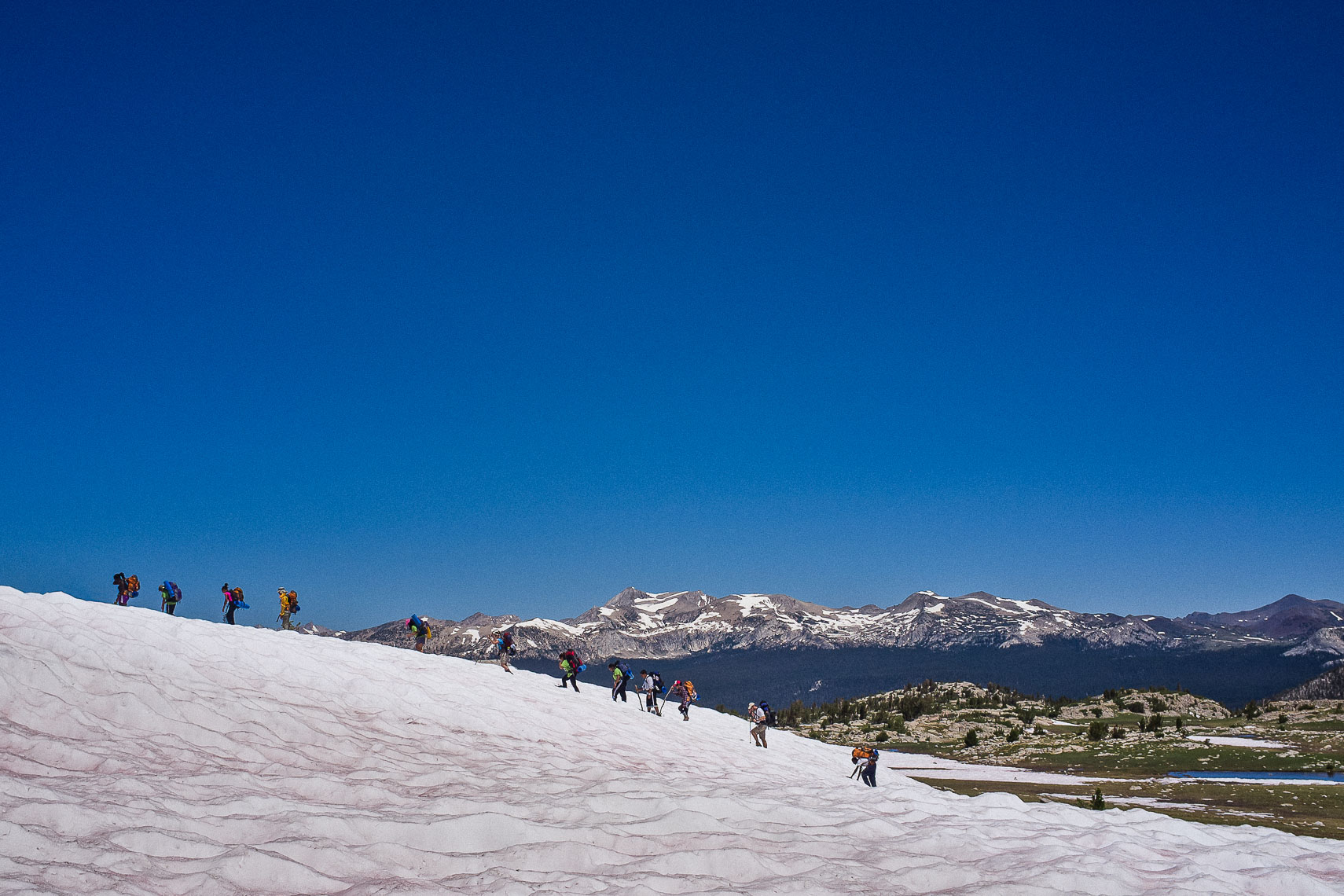 students hike through the snow above the tree line in yosemite national park - the woods project
